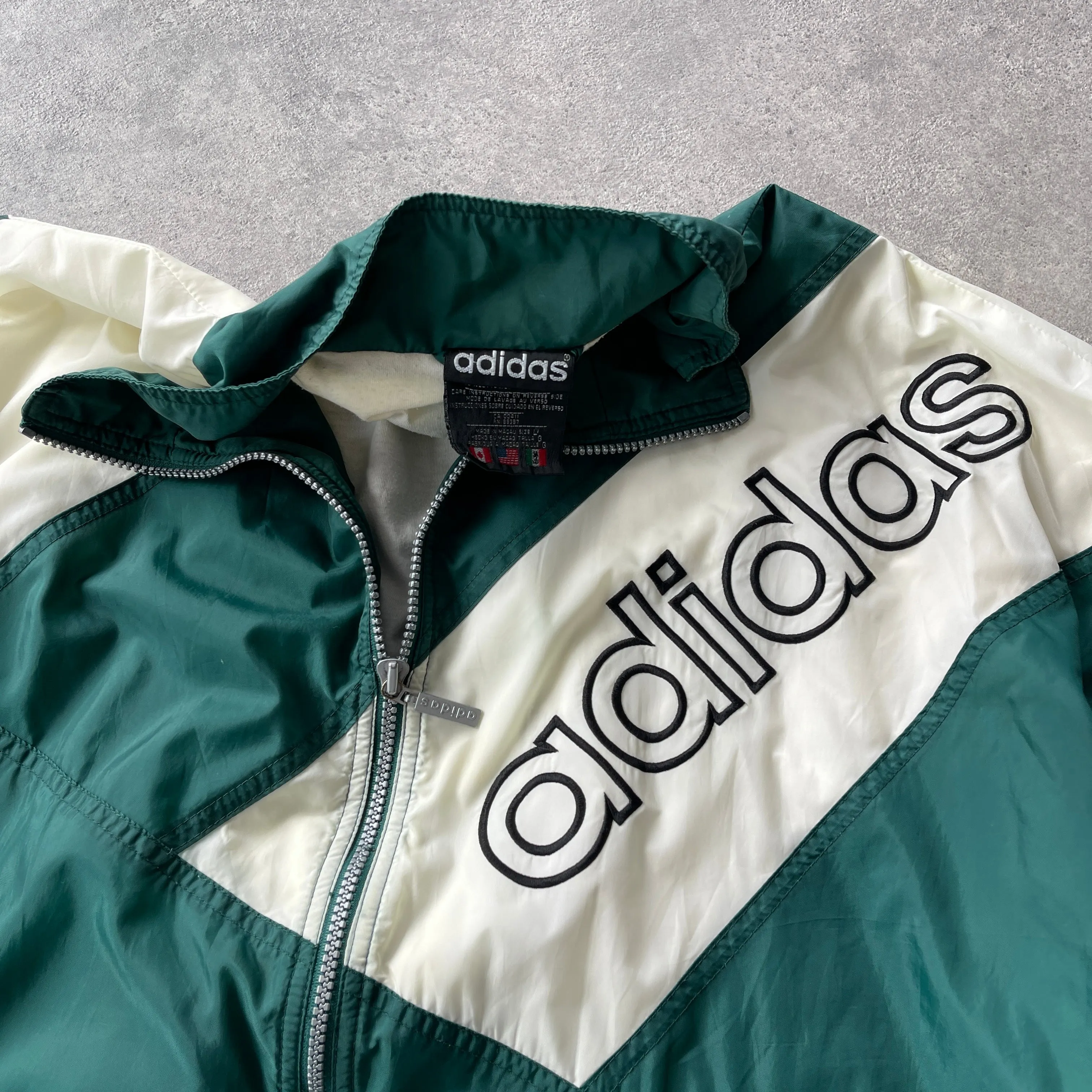 Adidas 1990s lightweight spellout shell jacket (L)