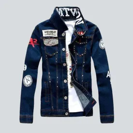 Rivet embellished embroidered denim jacket