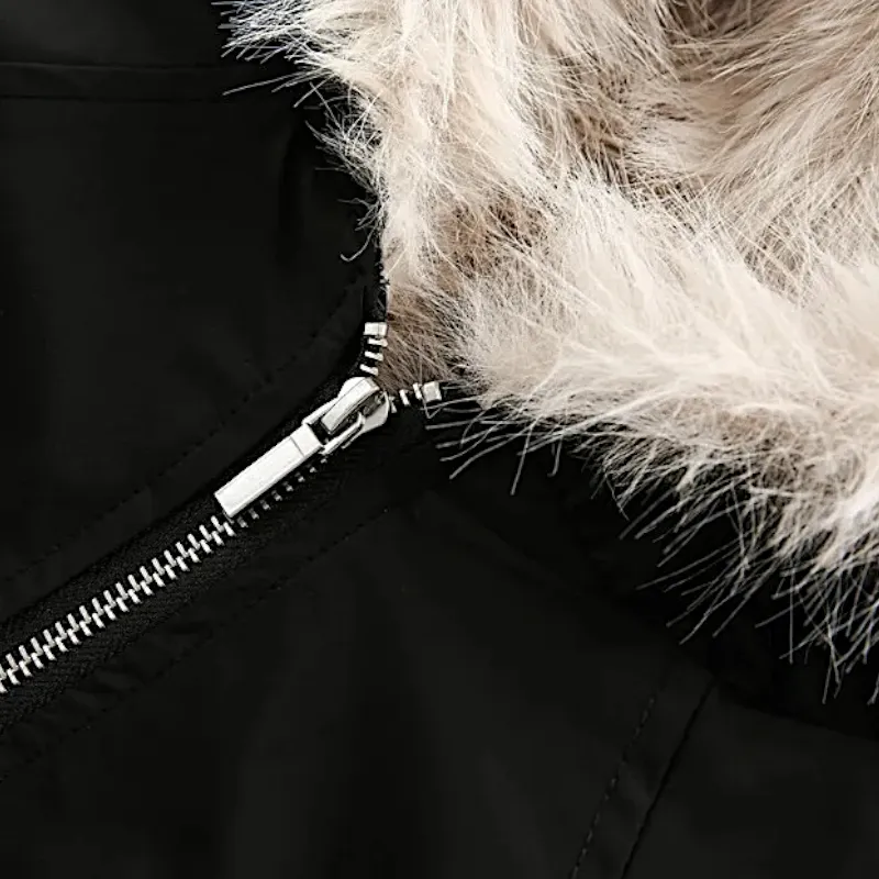 Technical fabric quilted jacket with fur trim